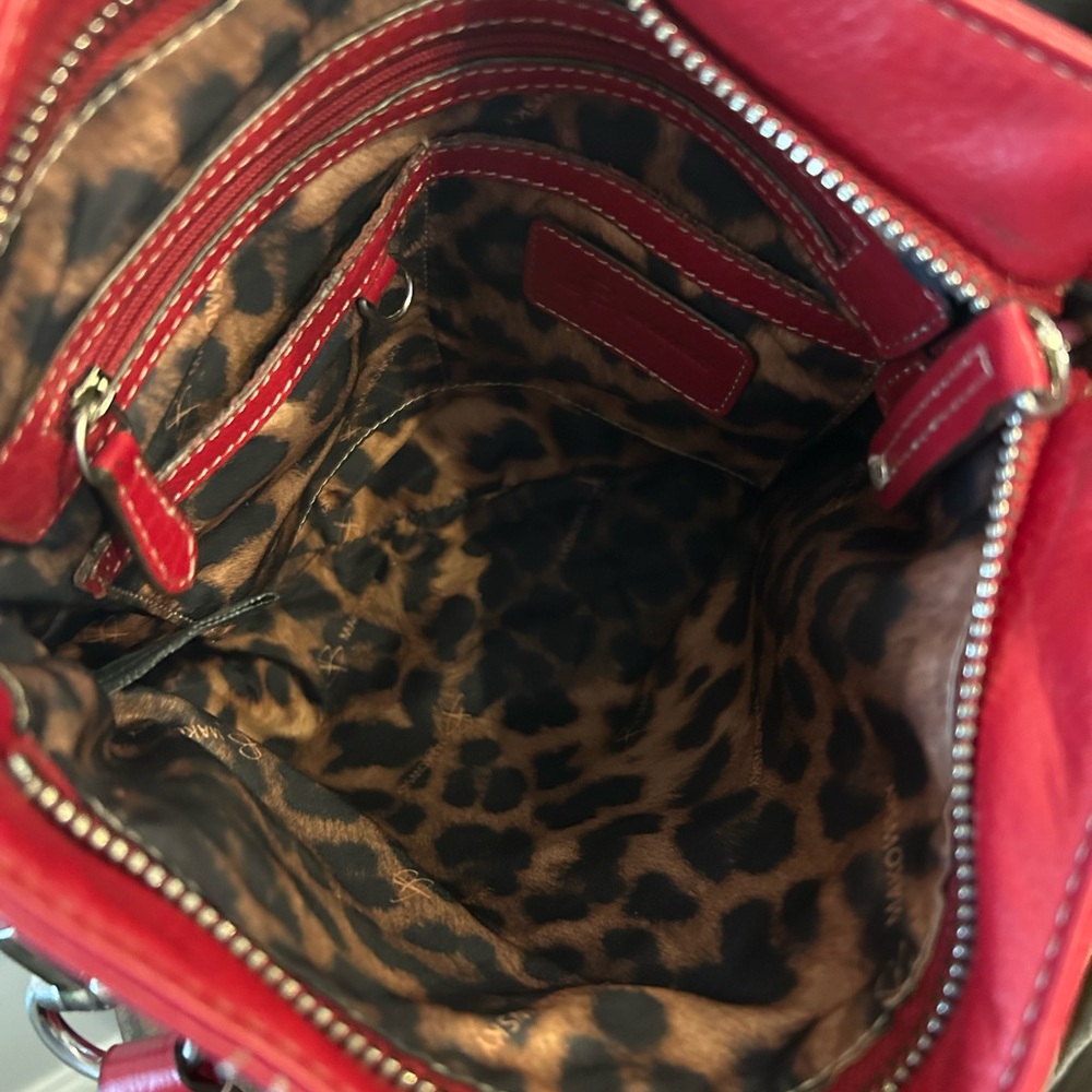 B. Makowsky red leather crossbody bag with a leopard lining. - Picture 6 of 8